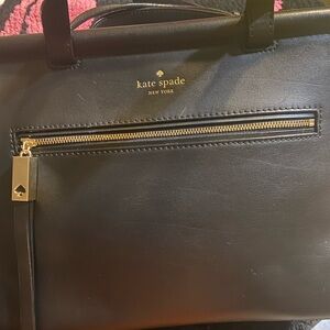 Pre love. In good condition kate spade Black Leather Wallet with Gold Zip Detail